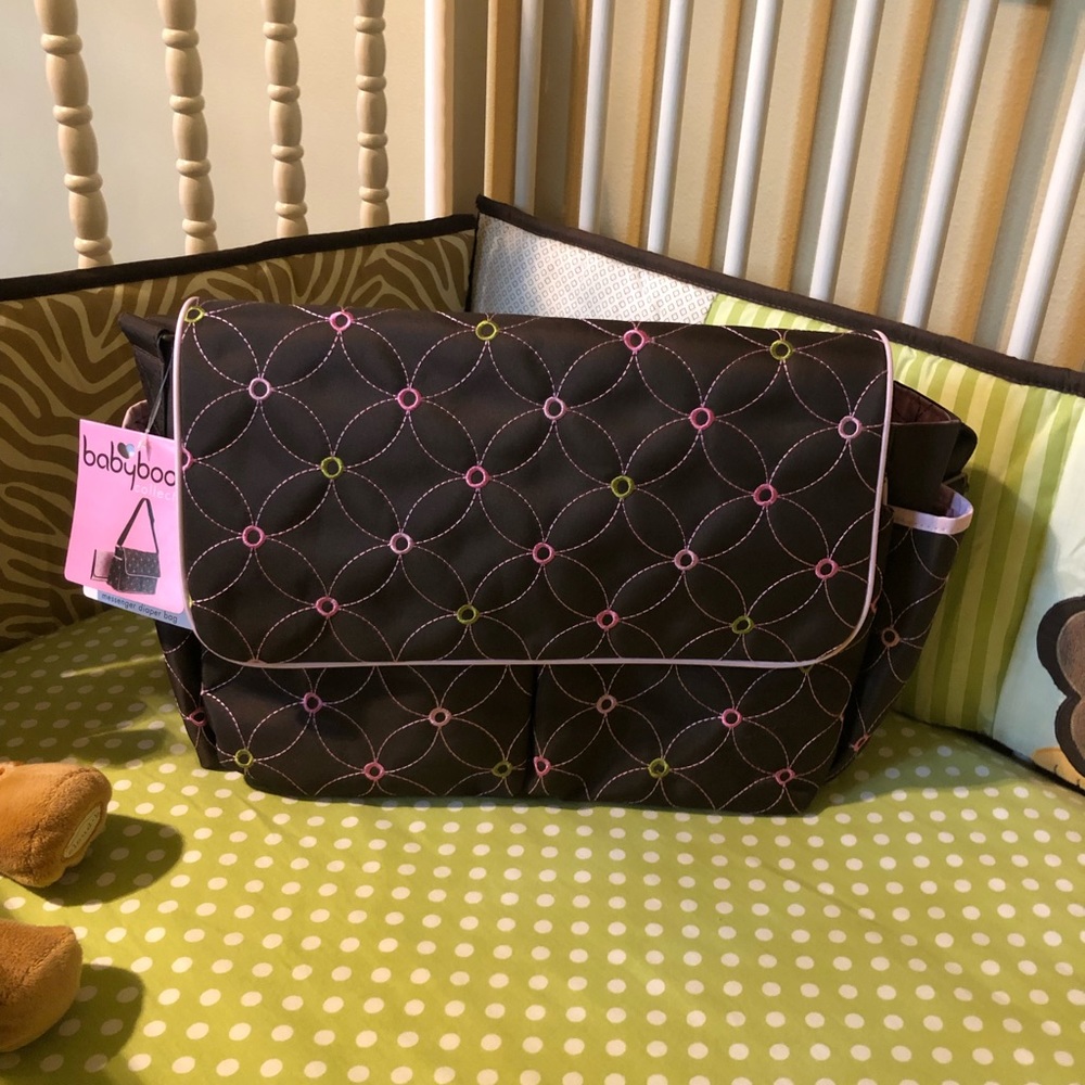 Babyboom messenger diaper bag, brown with pink trim.